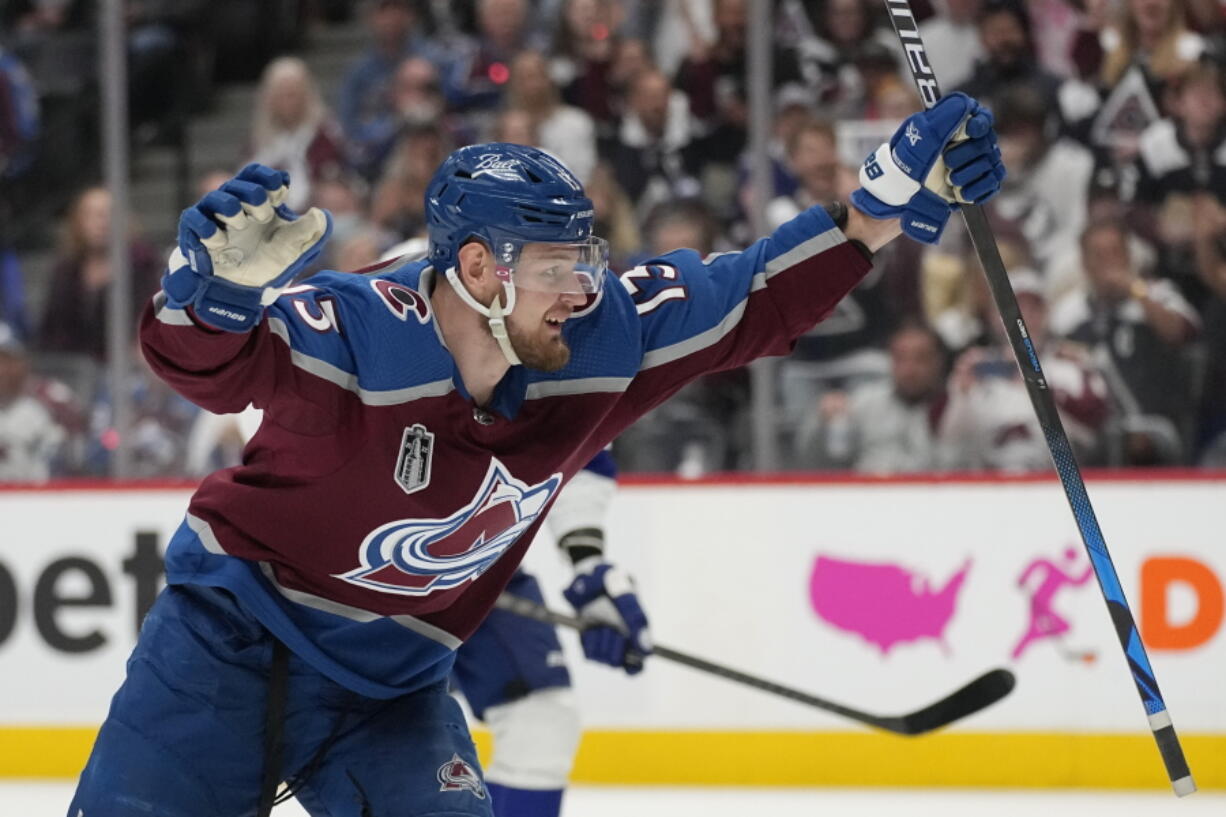 Colorado Avalanche right wing Valeri Nichushkin celebrates his goal against the Tampa Bay Lightning during the second period in Game 2 of the NHL hockey Stanley Cup Final, Saturday, June 18, 2022, in Denver.