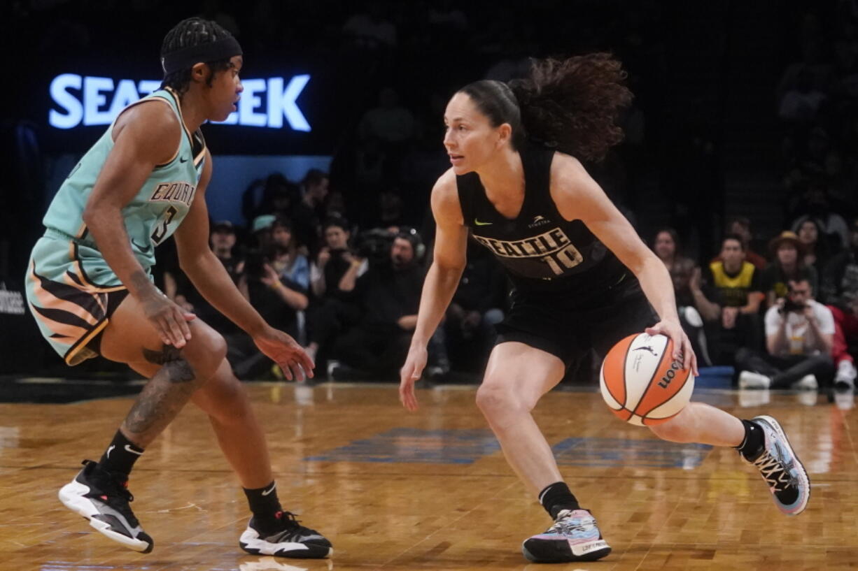 Seattle Storm guard Sue Bird (10) drives against New York Liberty guard CrystalDangerfield during the first half of WNBA basketball game Sunday, June 19, 2022 at Madison Square Garden in New York.