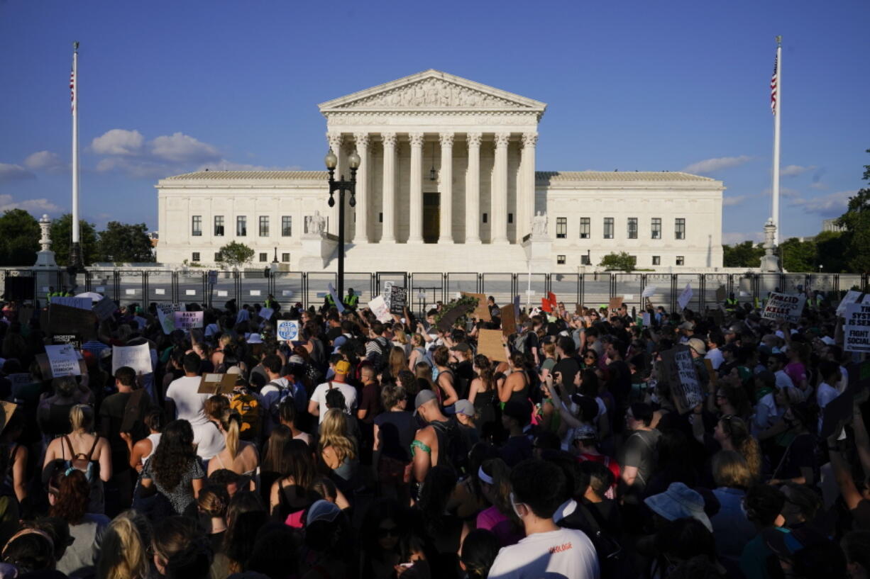 FILE - Protesters fill the street in front of the Supreme Court after the court's decision to overturn Roe v. Wade in Washington, June 24, 2022. Public opinion on abortion is nuanced, but polling shows broad support for Roe and for abortion rights. Seventy percent of U.S. adults said in a May AP-NORC poll that the Supreme Court should leave Roe as is, not overturn it.