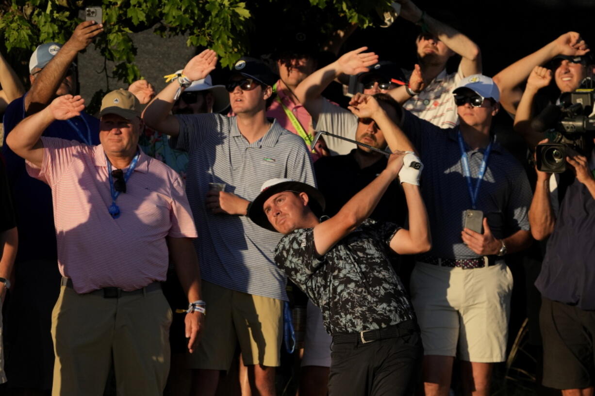 Joel Dahmen watches his shot on the 18th hole during the second round of the U.S. Open golf tournament at The Country Club, Friday, June 17, 2022, in Brookline, Mass. (AP Photo/Robert F.