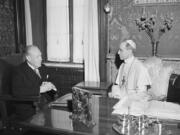 FILE - President Truman's envoy to the Vatican, Myron C. Taylor, left, has an audience with Pope Pius XII at Castelgandolfo near Rome, on Aug. 26, 1947. The Vatican has long defended its World War II-era pope, Pius XII, against criticism that he remained silent as the Holocaust unfolded, insisting that he worked quietly behind the scenes to save lives.