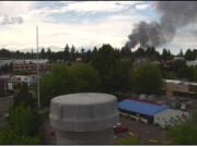 Smoke from a house fire at 8500 block of 80th Avenue is seen Thursday afternoon on a traffic camera.