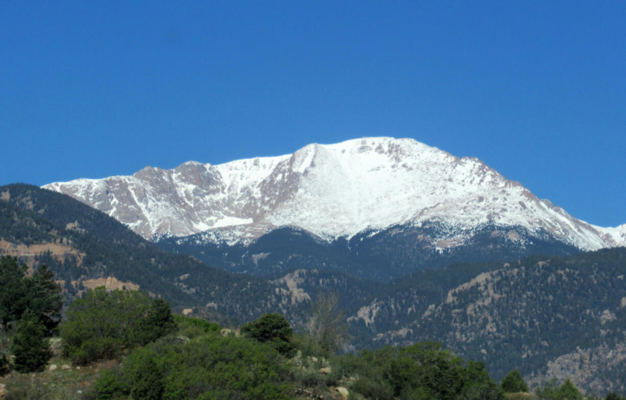 Pikes Peak covered in snow in early summer in Colorado.