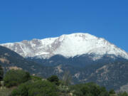 Pikes Peak covered in snow in early summer in Colorado.