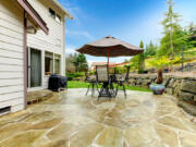 Decorative flagstones can make for a distinctive patio surface.