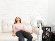 Fan energy is minimal, so you're not generating a lot of heat from using them -- especially relative to how much comfort you gain in return.