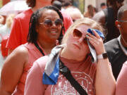 A crowd braves the hot weather at Universal CityWalk in June. According to one survey, Orlando, Fla., is the "sweatiest city" in all of America. (Stephen M.