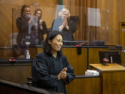 Newly sworn-in Clark County Superior Court Judge Tsering Cornell smiles during applause Friday at the Clark County Courthouse. Cornell is Clark County's first Asian American judge.