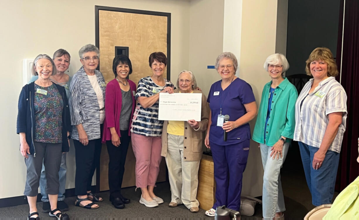 The Clark County Newcomers Club presented a check for $6,279.60 to Lynn Crawford of Hope Dementia on July 5 at their monthly coffee meeting.