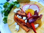 These roasted sweet potato fajitas are knock-your-socks-off delicious. The secret's in the spice, a mix of cumin and cinnamon.