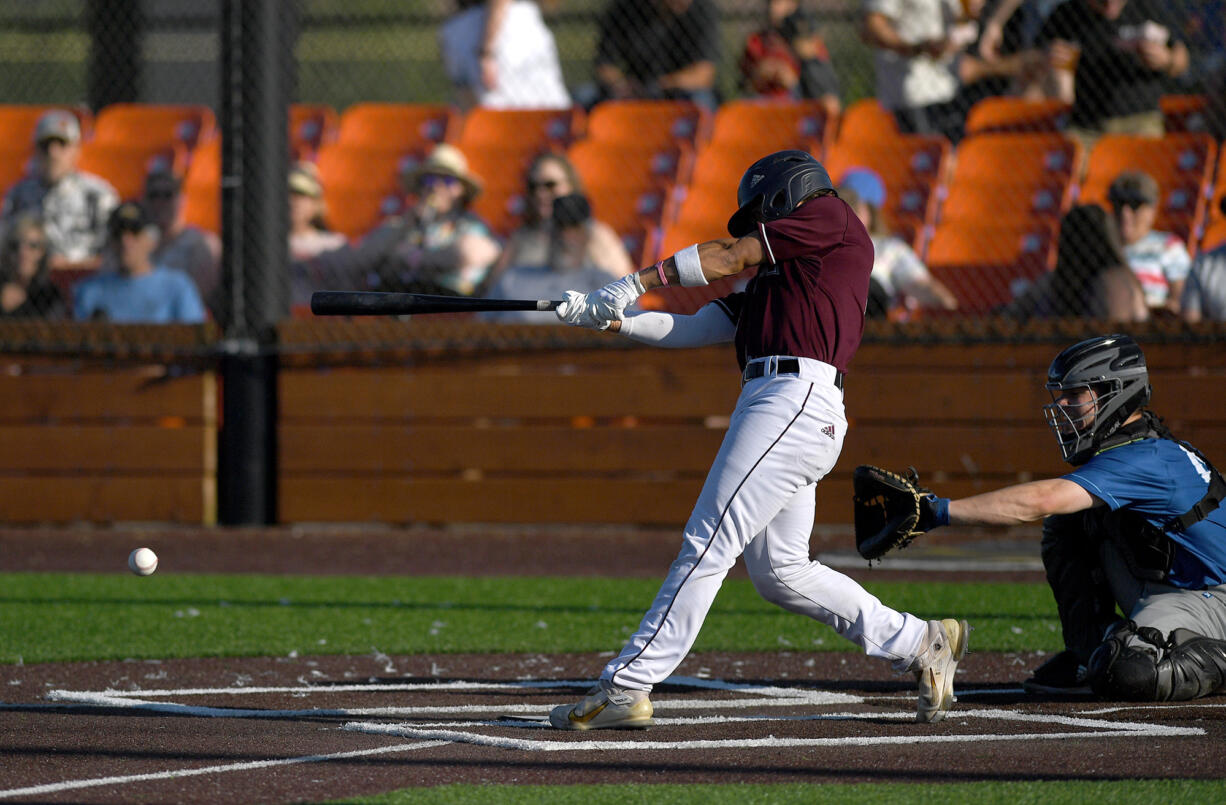 Raptors left fielder Jacob Sharp hits a ground ball Friday, July 15, during a game between the Raptors and the Springfield Drifters at the Ridgefield Outdoor Recreation Center.