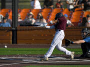 Raptors left fielder Jacob Sharp hits a ground ball Friday, July 15, during a game between the Raptors and the Springfield Drifters at the Ridgefield Outdoor Recreation Center.