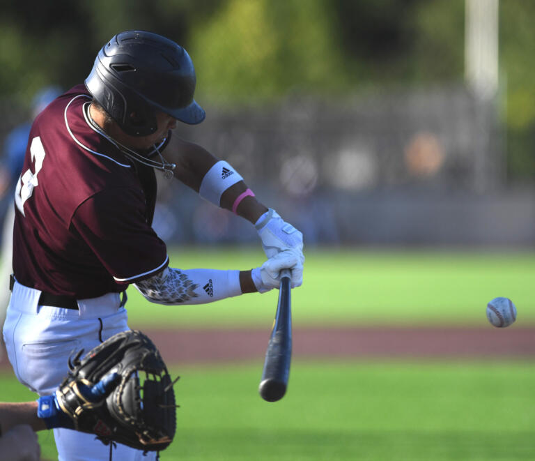 Raptors outfielder Jacob Sharp swings at a pitch Friday, July 15, during a game between the Raptors and the Springfield Drifters at the Ridgefield Outdoor Recreation Center.