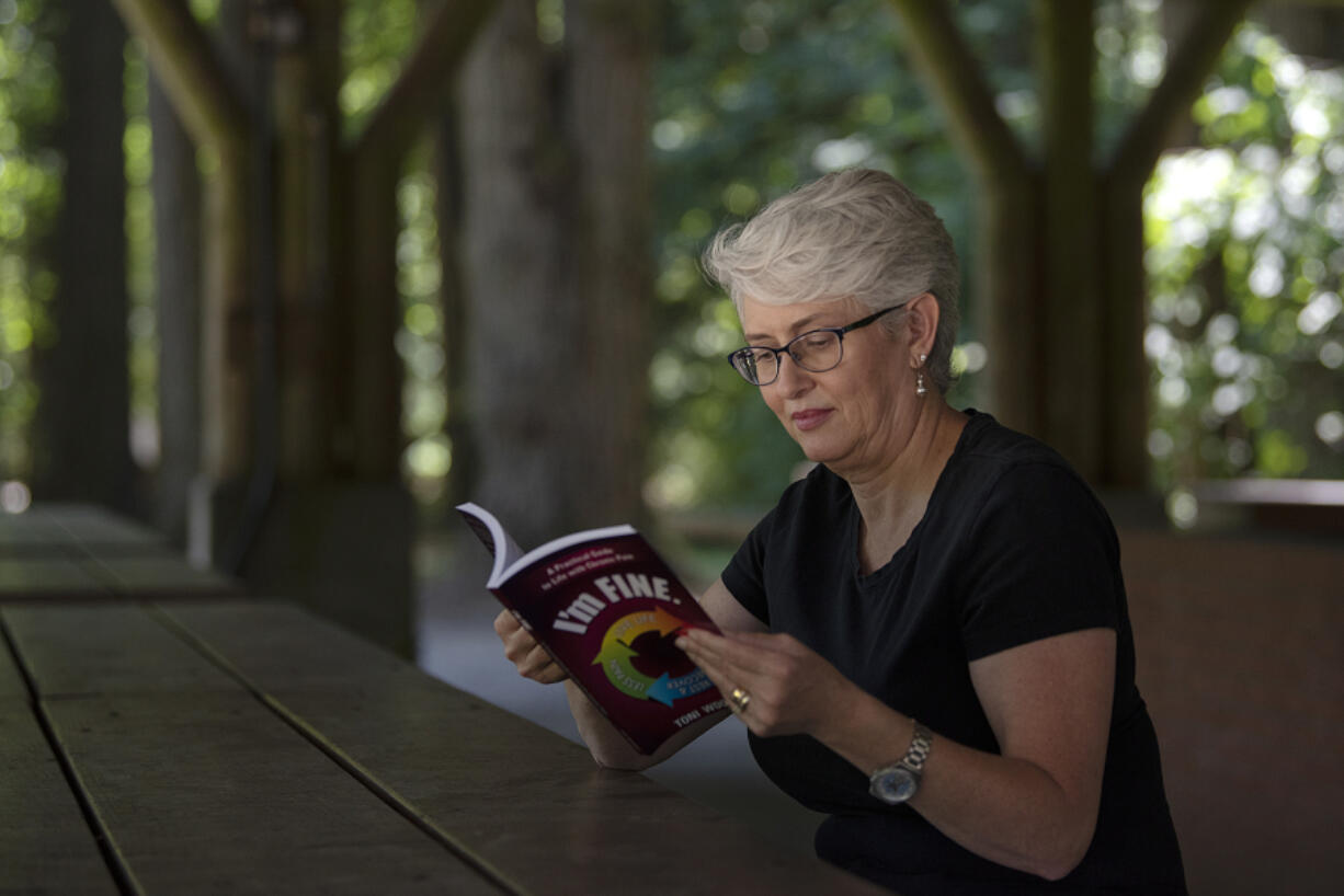 Toni Woodard of Battle Ground recently self-published "I'm FINE: A Practical Guide for Life with Chronic Pain." Woodard has suffered from chronic back pain for more than 25 years, and she wrote the book to help others navigate life with chronic pain.