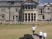 Tiger Woods of the US gestures to the crowd at the end of his second round of the British Open golf championship on the Old Course at St. Andrews, Scotland, Friday July 15, 2022. The Open Championship returns to the home of golf on July 14-17, 2022, to celebrate the 150th edition of the sport's oldest championship, which dates to 1860 and was first played at St. Andrews in 1873.