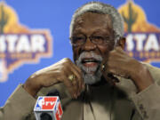 FILE - Former NBA great Bill Russell speaks during a news conference at the NBA All-Star basketball weekend, Feb. 14, 2009, in Phoenix. The NBA great Bill Russell has died at age 88. His family said on social media that Russell died on Sunday, July 31, 2022. Russell anchored a Boston Celtics dynasty that won 11 titles in 13 years.