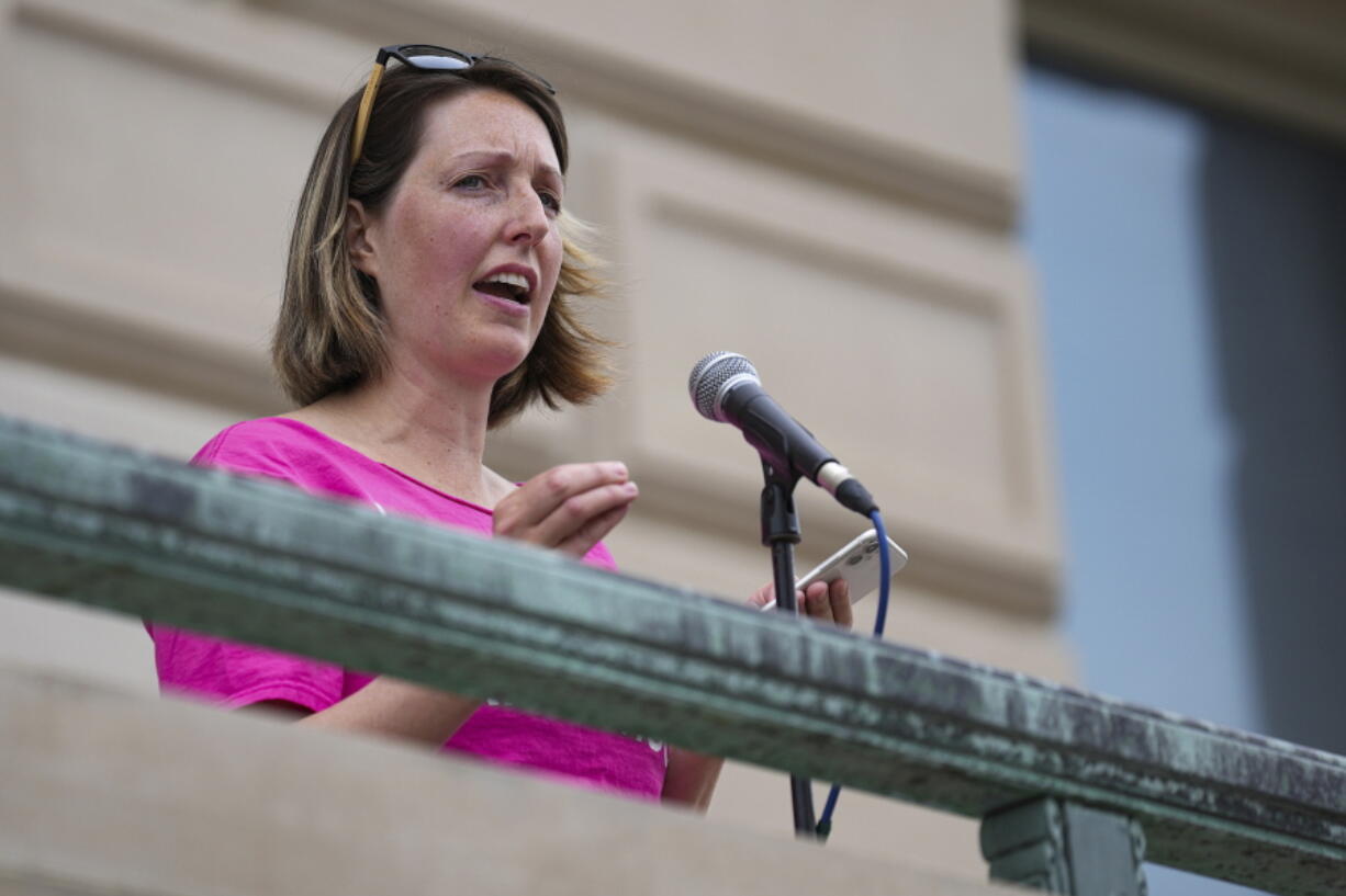 Dr. Caitlin Bernard, a reproductive healthcare provider, speaks during an abortion rights rally on Saturday, June 25, 2022, at the Indiana Statehouse in Indianapolis. The lawyer for Bernard, an Indiana doctor at the center of a political firestorm after speaking out about a 10-year-old child abuse victim who traveled from Ohio for an abortion, said Thursday, JUly 14, 2022, that her client provided proper treatment and did not violate any patient privacy laws in discussing the unidentified girl's case.