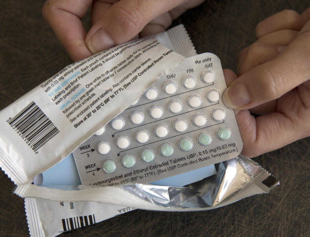 FILE - A one-month dosage of hormonal birth control pills is displayed in Sacramento, Calif., Aug. 26, 2016. A drug company is seeking U.S. approval for the first-ever birth control pill that women could buy without a prescription. The request from a French drugmaker sets up a high-stakes decision for the Food and Drug Administration amid the political fallout from the Supreme Court's recent decision overturning Roe v. Wade.