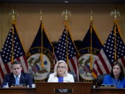 Vice Chair Liz Cheney, R-Wyo., center, joined by Rep. Adam Kinzinger, R-Ill., left, and Rep. Elaine Luria, D-Va., speaks as the House select committee investigating the Jan. 6 attack on the U.S. Capitol holds a hearing at the Capitol in Washington, Thursday, July 21, 2022.