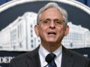 FILE - Attorney General Merrick Garland speaks during a news conference at the Department of Justice, June 13, 2022 in Washington. Garland told reporters Wednesday, July 19, that "we do not do our investigations in public," and in explaining his silence on the question, called the Jan.