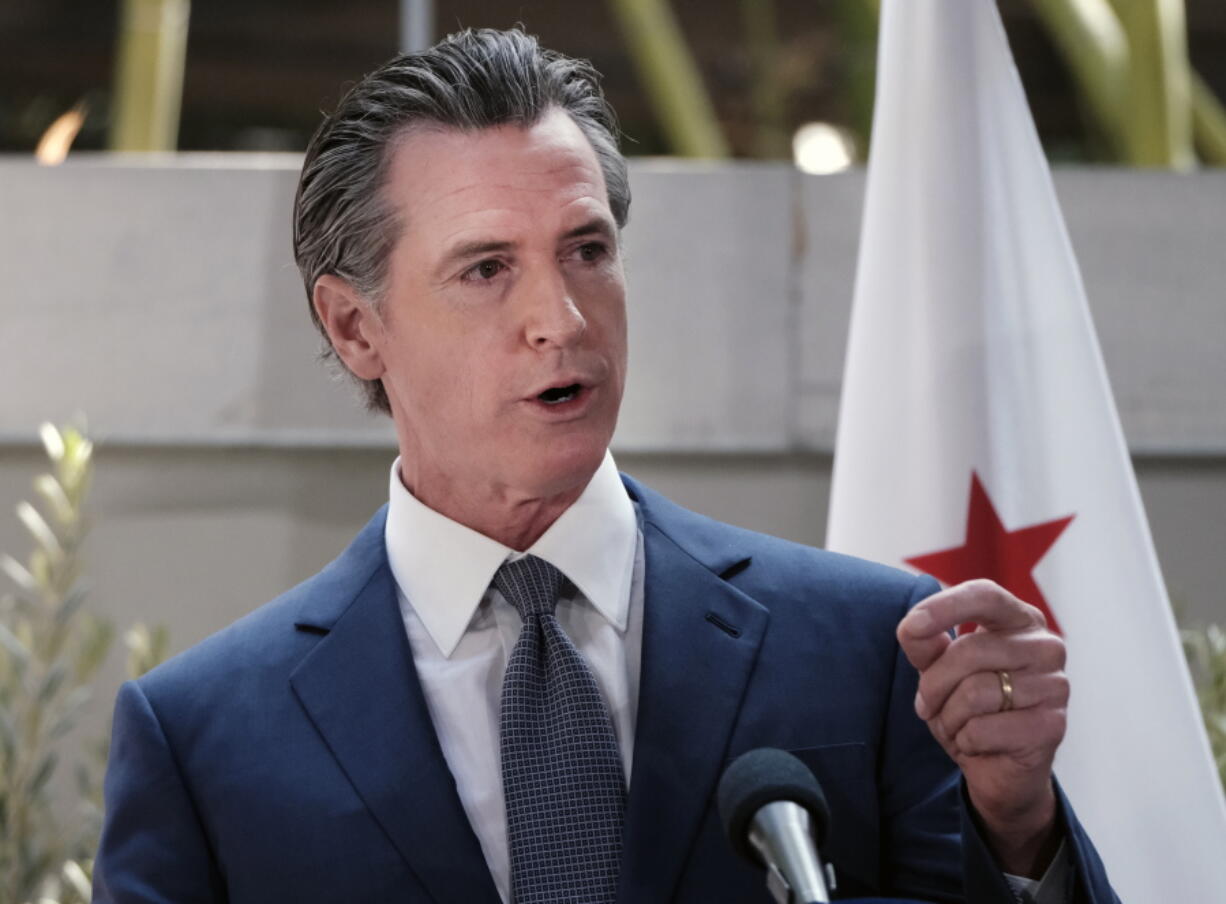 FILE - California Governor Gavin Newsom answers questions at a news conference in Los Angeles, on June 9, 2022. As President Joe Biden runs up against the limits of what he can do on abortion, gun control and other issues without larger Democratic majorities in Congress, some in his party want more fire and boldness than the president's acknowledgement of their frustration and calls imploring people to vote in November.