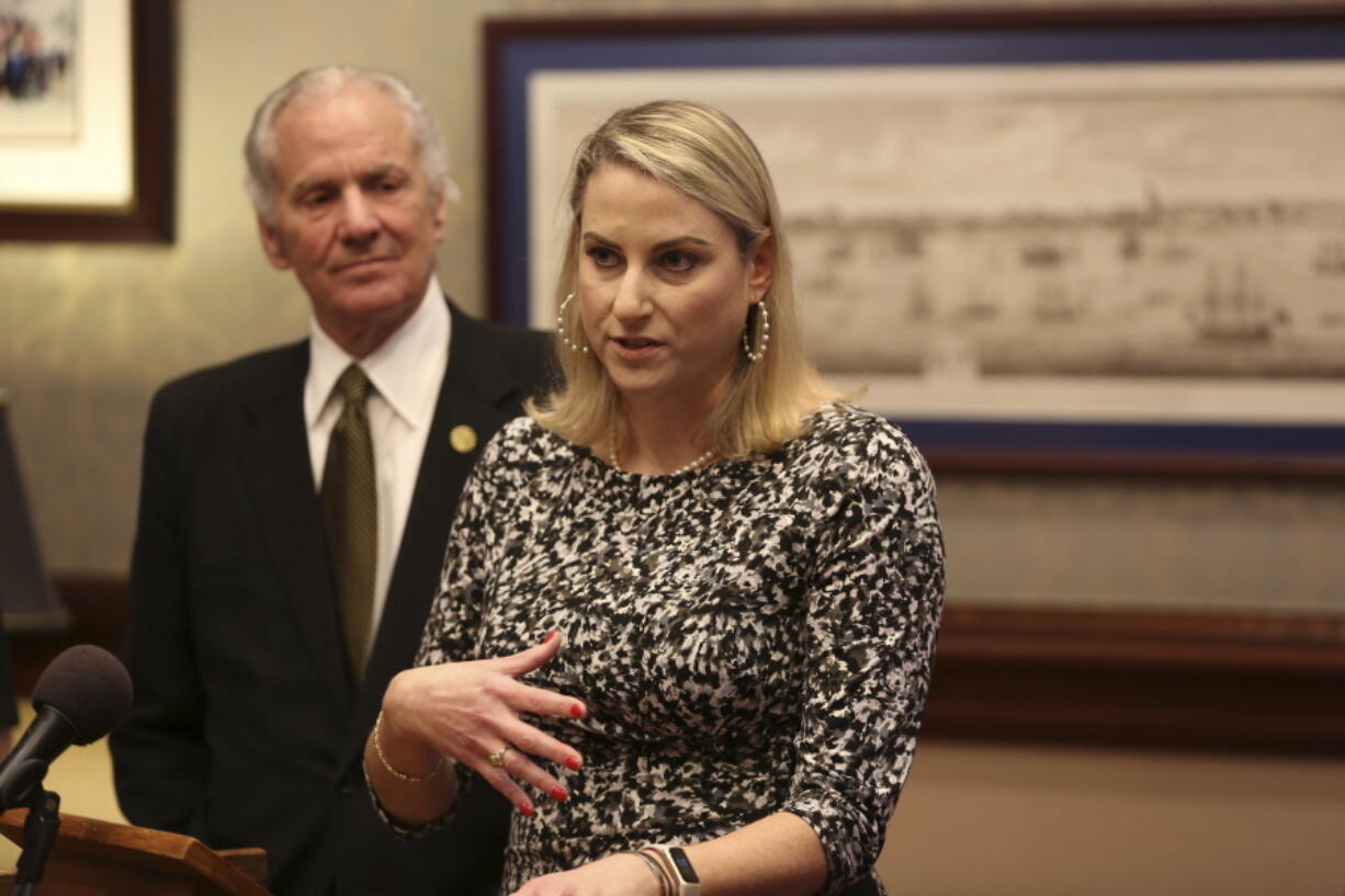 FILE - Eden Hendrick speaks after Gov. Henry McMaster nominates her to be the next director at the South Carolina Department of Juvenile Justice in Columbia, S.C., Tuesday, Feb. 22, 2022. Hendrick, the new Department of Juvenile Justice director, is leading the troubled agency after two of her predecessors resigned following state audits that found major faults, from a "useless and ineffective" in-house police force to an inability to keep children safe.