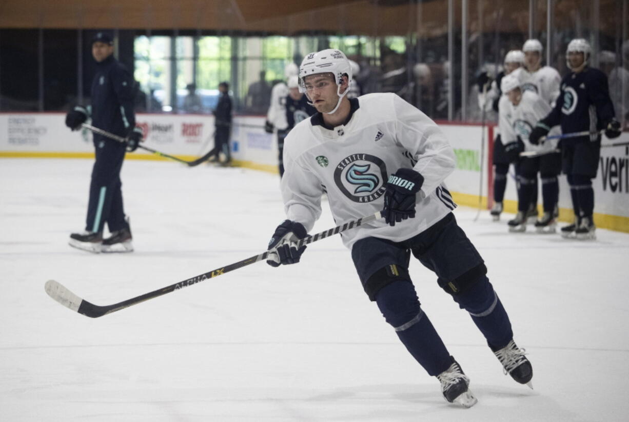 Seattle Kraken's Shane Wright (51) skates during a drill at the NHL hockey team's first Prospect Development Camp, Monday, July 11, 2022, in Seattle. For several years, Shane Wright was predetermined to be the No. 1 pick in the NHL draft. When the draft finally arrived, Wright tumbled right into the waiting arms of the Seattle Kraken, a team in need of a boost heading into its second season.