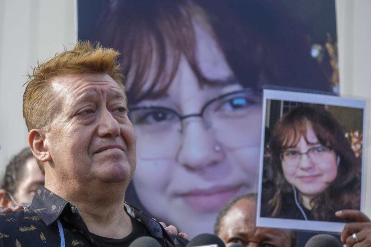 FILE - Juan Pablo Orellana Larenas, father of Valentina Orellana Peralta, speaks during a news conference outside the Los Angeles Police Department headquarters in Los Angeles on Dec. 28, 2021. The parents of Valentina Orellana Peralta, a 14-year-old girl killed by Los Angeles police in a clothing store last year, have filed a lawsuit against the department and the officer whose rifle round pierced a dressing room wall. Peralta and her mother were shopping for Christmas clothes on Dec. 23 at a Burlington store in the San Fernando Valley's North Hollywood neighborhood. (AP Photo/Ringo H.W.