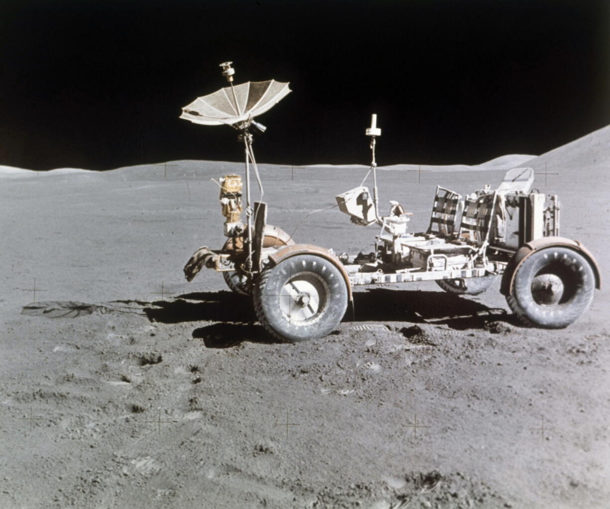 The lunar rover sits on the west edge of the moon's Mount Hadley in August 1971. Lockheed Martin and Goodyear are working on a new lunar vehicle.