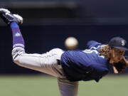 Seattle Mariners starting pitcher Logan Gilbert works against a San Diego Padres batter during the first inning of a baseball game Tuesday, July 5, 2022, in San Diego.