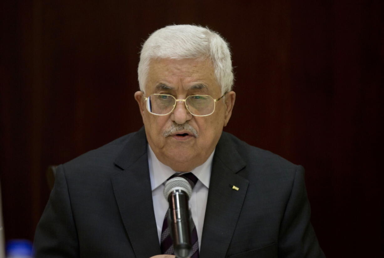 FILE - Palestinian President Mahmoud Abbas chairs the Palestine Liberation Organization (PLO) Executive Committee meeting at the Palestinian Authority headquarters, in the West Bank city of Ramallah, Wednesday, Nov. 4, 2015. Palestinian President Abbas and Israeli Defense Minister Benny Gantz met Thursday, July 7, 2022, in the occupied West Bank to discuss security coordination ahead of U.S. President Joe Biden's visit to the region next week.