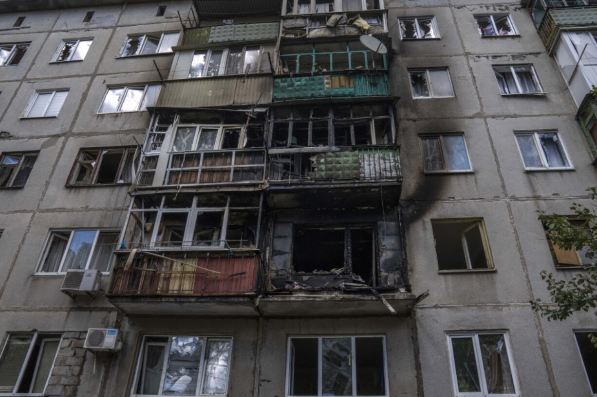 A five-story residential building damaged from a rocket attack on a residential area, in Kramatorsk, eastern Ukraine, Tuesday, July 19, 2022.