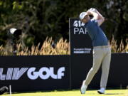 Branden Grace watches his tee shot on the seventh hole during the second round of the Portland Invitational LIV Golf tournament in North Plains, Ore., Friday, July 1, 2022.