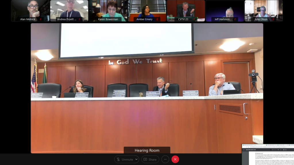 Clark County Council members, from left, Temple Lentz, Gary Medvigy and Richard Rylander Jr., attend the hearing on an interim land-use ordinance in person July 5, 2022.