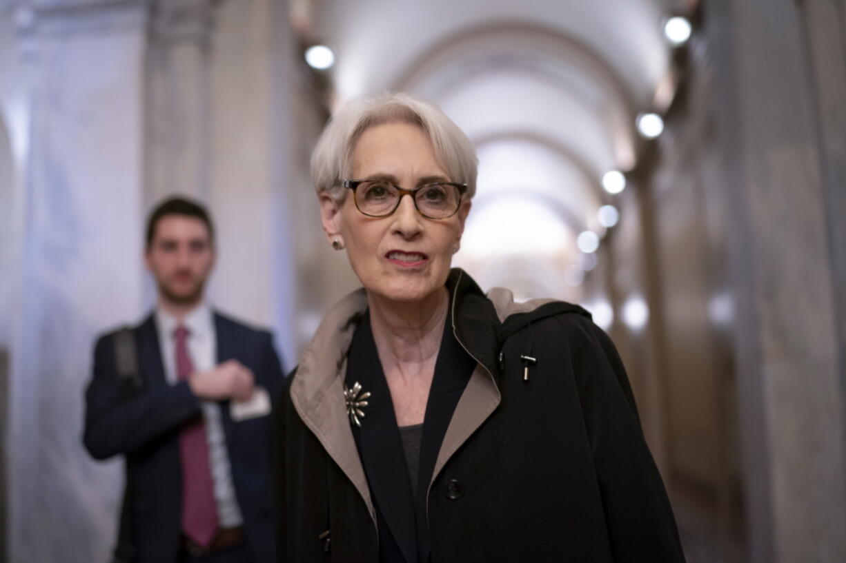 FILE - Deputy Secretary of State Wendy Sherman arrives at the Capitol as senators receive a briefing on the war in Ukraine, in Washington, March 30, 2022. The U.S. is sending a high-profile diplomatic delegation to visit the Solomon Islands led by Sherman and including Ambassador to Australia Caroline Kennedy. (AP Photo/J.