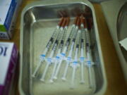 Syringes with vaccines against Monkeypox are ready to be used at a medical center in Barcelona, Spain, Tuesday, July 26, 2022.