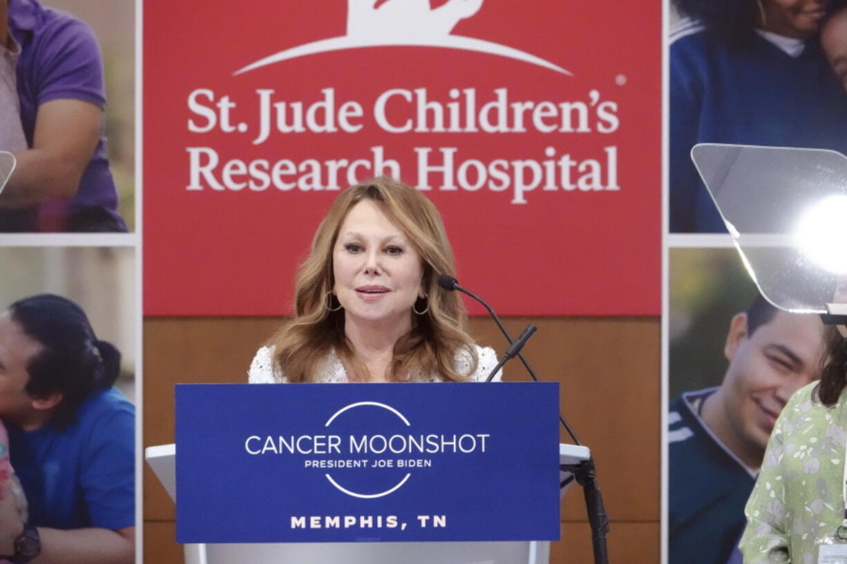 FILE - Marlo Thomas speaks before introducing first lady Jill Biden as she visits the St. Jude Children's Research Hospital on March 25, 2022, in Memphis, Tenn. The hospital said Wednesday, July 13, 2022, that they are increasing its investment by $1.4 billion for a strategic plan that includes programs advancing the study and treatment of pediatric cancer and other catastrophic diseases.