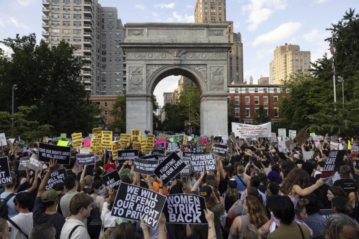 FILE - Abortion rights activists gather for a protest following the U.S. Supreme Court's decision to overturn Roe v. Wade, at Washington Square Park, Friday, June 24, 2022, in New York. The Supreme Court's overturning of Roe v. Wade has ushered in a new era of funding on both sides of the abortion debate. With the legality of abortion now up to individual states to determine, an issue that was long debated by legislators and philanthropists when it was merely theoretical is suddenly a real-world circumstance for people across the country.