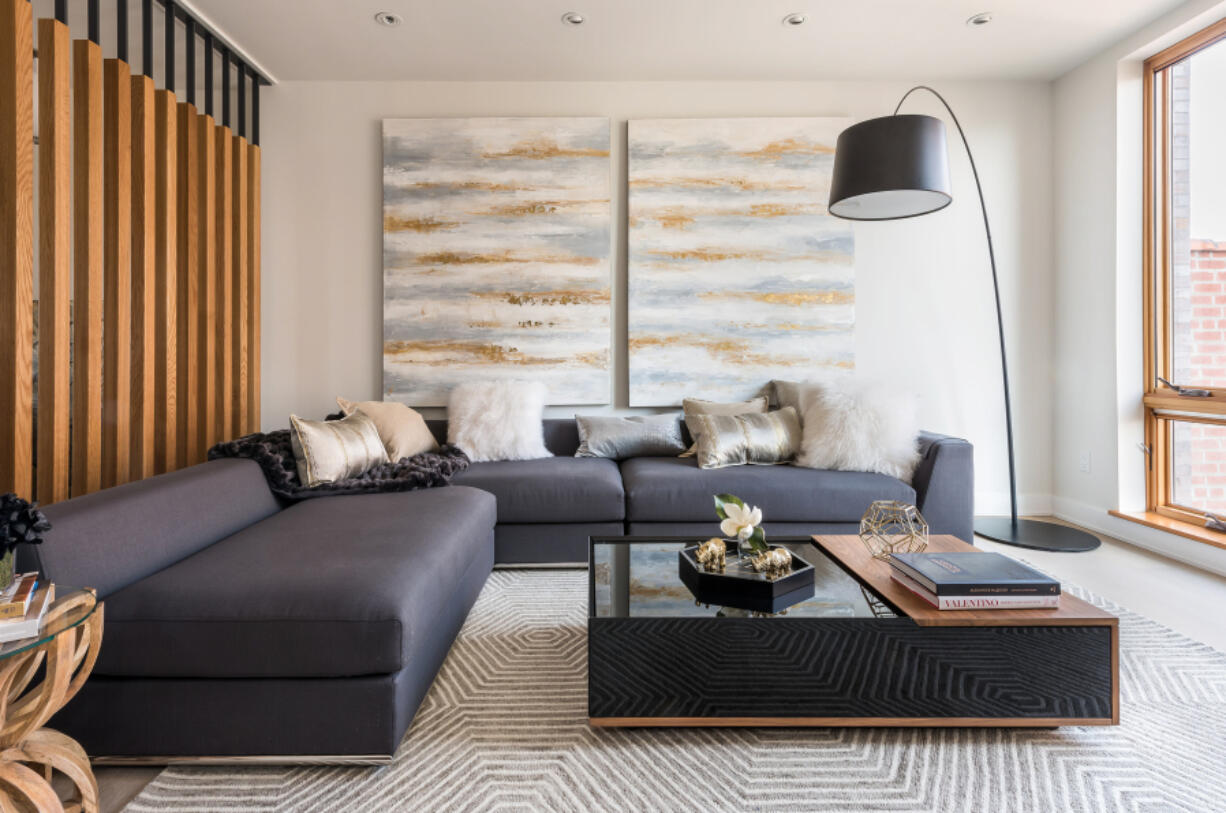 This living room features an accent wall with a prominent wood feature.