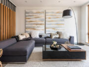 This living room features an accent wall with a prominent wood feature.