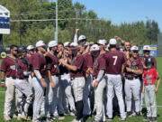 Ridgefield Raptors players break from the post-game huddle following a 4-3 win over the Corvallis Knights on Sunday in Ridgefield.