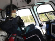 Flight nurse Duane Rorie prepares for a flight at North Colorado Medical Center on Aug. 1, 2022, in Greeley, Colorado. Med Evac is celebrating 40 years in Northern Colorado and took members of the media up for a short flight. Med Evac has flown more than 30,000 missions during those 40 years.