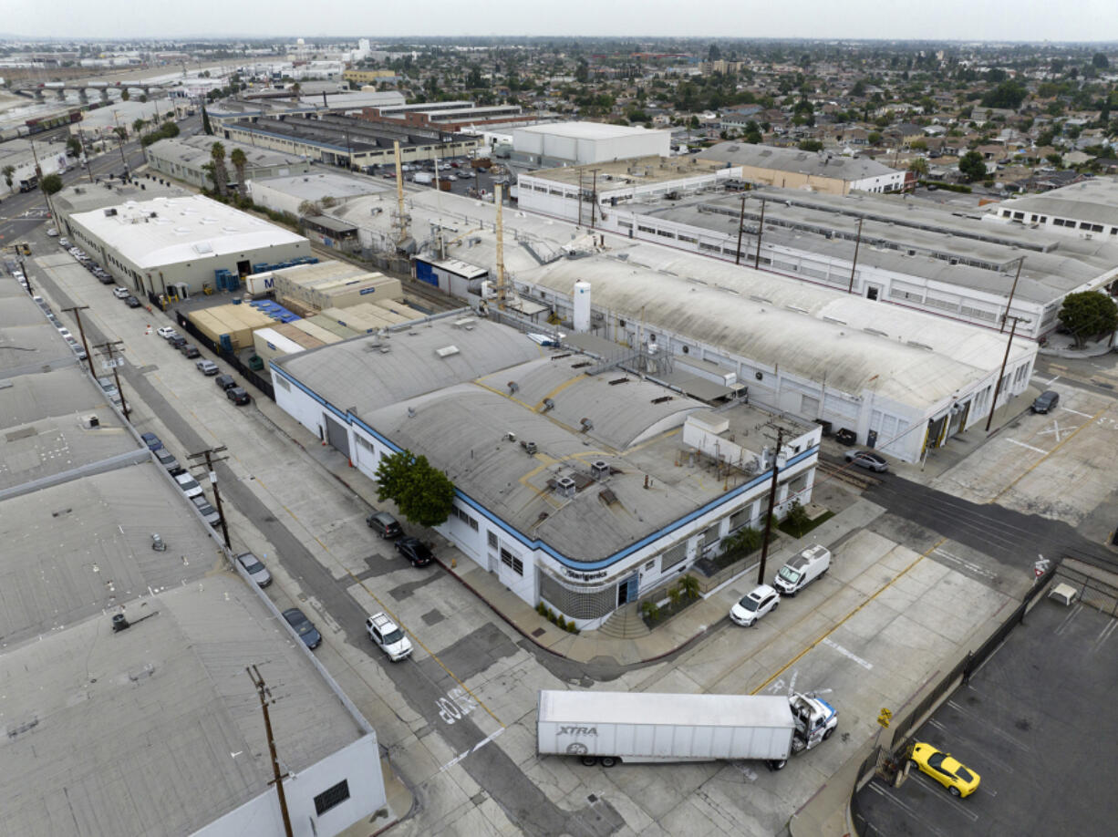 The South Coast Air Quality Management District has issued several notices of violations to three facilities that sterilize medical equipment in Southern California for elevated concentrations of ethylene oxide, including Sterigenics in Vernon (center building). (Myung J.