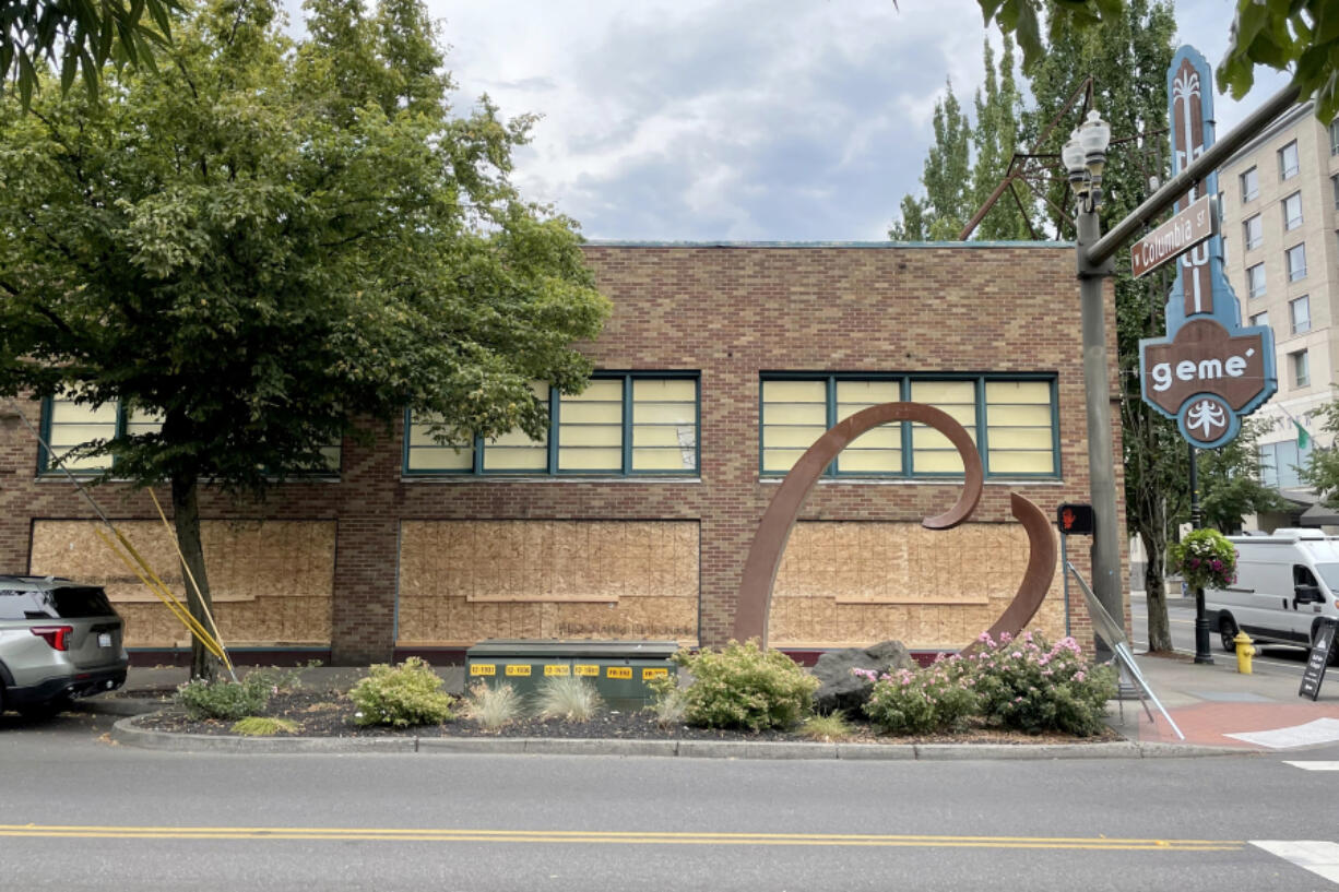 A skateboard-weilding vandal smashed multiple windows at Geme Art and two other businesses in downtown Vancouver on Tuesday. A man was later arrested in connection with the incident.