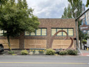 A skateboard-weilding vandal smashed multiple windows at Geme Art and two other businesses in downtown Vancouver on Tuesday. A man was later arrested in connection with the incident.