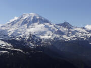 Mount Rainier is seen June 19, 2013 from a helicopter flying south of the mountain and west of Yakima.