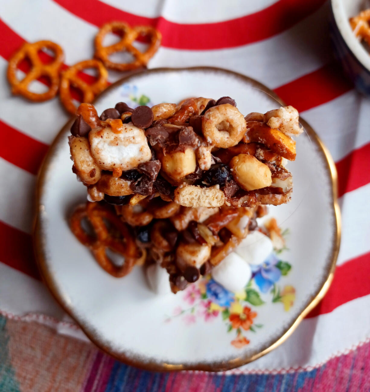 These sweet-and-salty cereal bars are made with toasted oat cereal, pretzels, peanuts and other mix-ins for no-bake goodness.