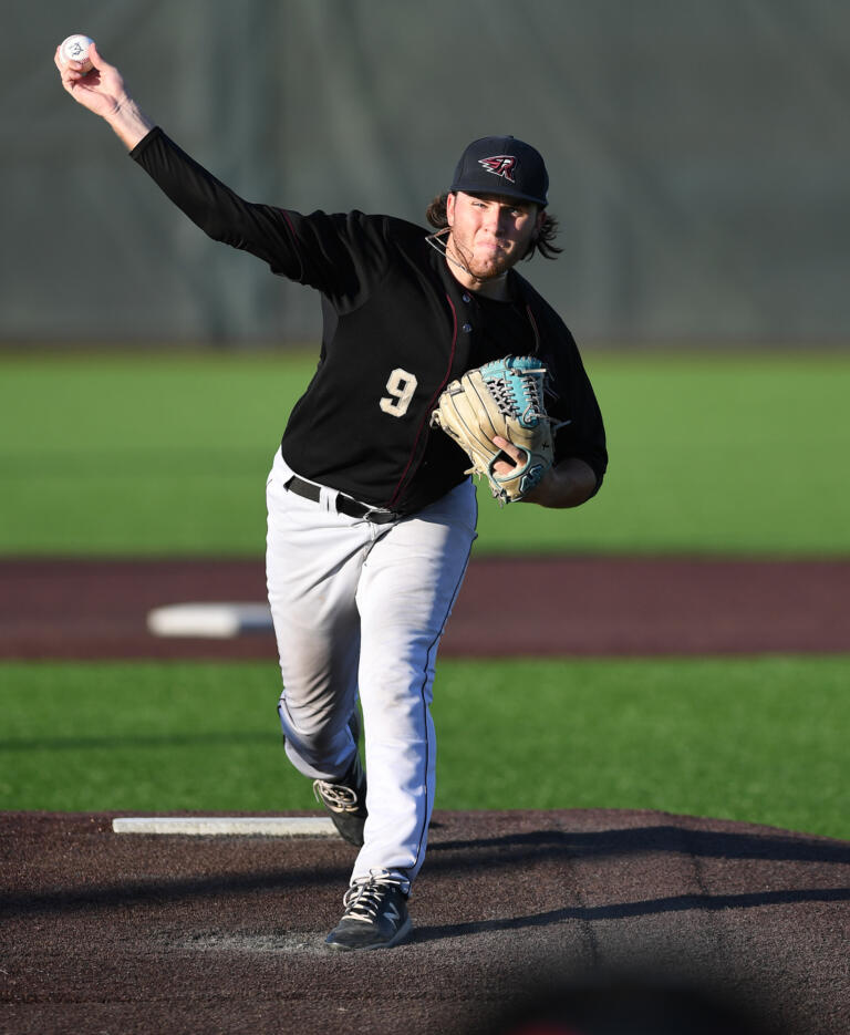 Raptors pitcher Jeter Schuerman warms between inningsTuesday, Aug. 9, 2022, during a playoff game between Ridgefield and the Portland Pickles at the Ridgefield Outdoor Recreation Complex.