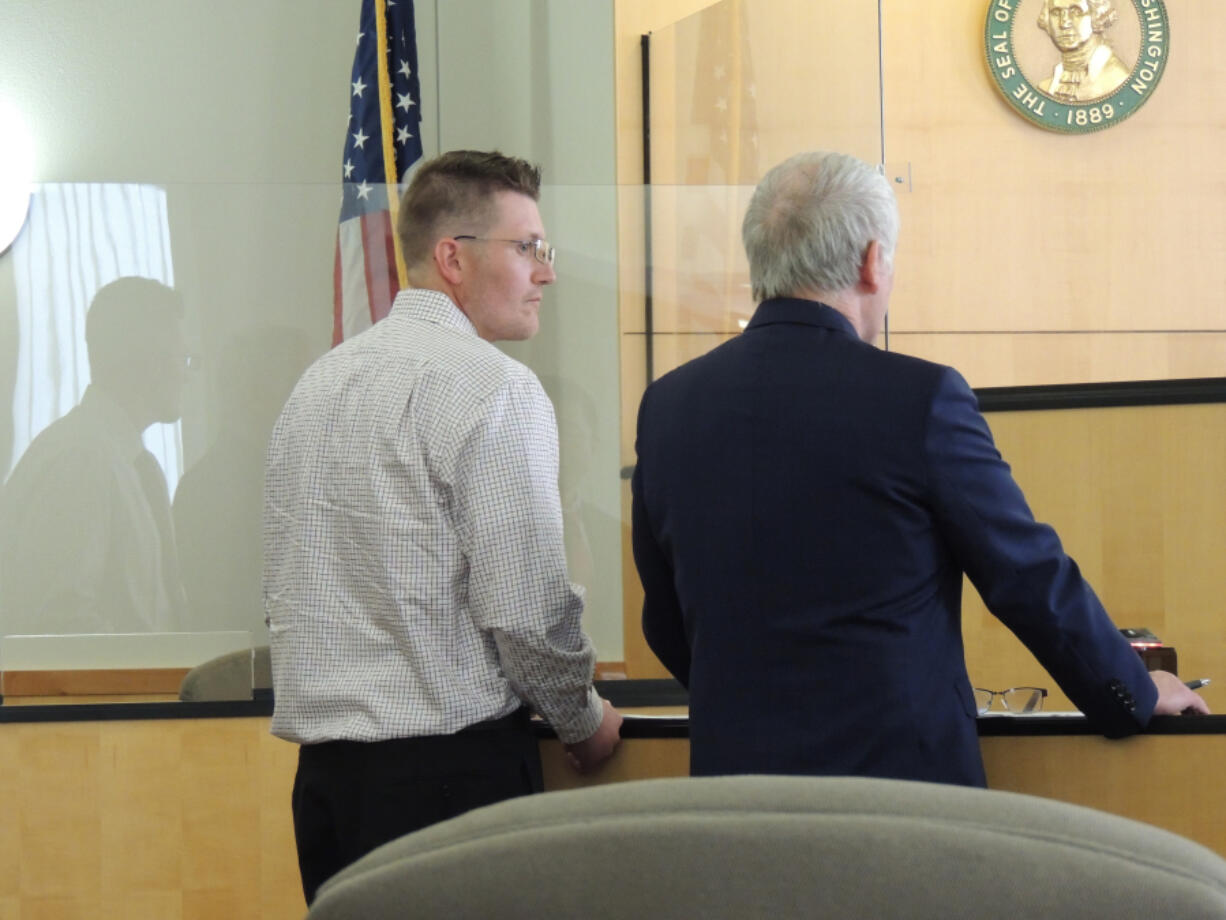 Jarrod A. Wiebe, 34, left, takes advantage of a plea deal Friday previously offered to him in his 2013 case. The Washington State Court of Appeals vacated his 2014 convictions after ruling in December that his attorney failed to notify him that his statements to law enforcement would be admissable at trial because his co-defendants had taken similar plea deals.