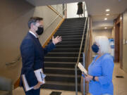 Mike Reardon, executive director of Area Agency on Aging and Disabilities of Southwest Washington, left, welcomes U.S. Sen. Patty Murray before giving her a tour of the facility Wednesday morning. Sen. Murray spoke with local leaders and health care advocates about how the Inflation Reduction Act will allow Medicare to negotiate lower prescription drug costs.